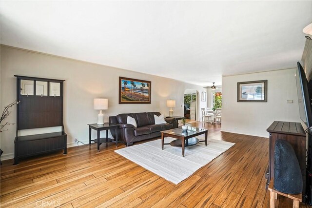 1413 Avenida De La Estrella, San Clemente, CA 92672 - living room with light wood-type flooring and arched walkways