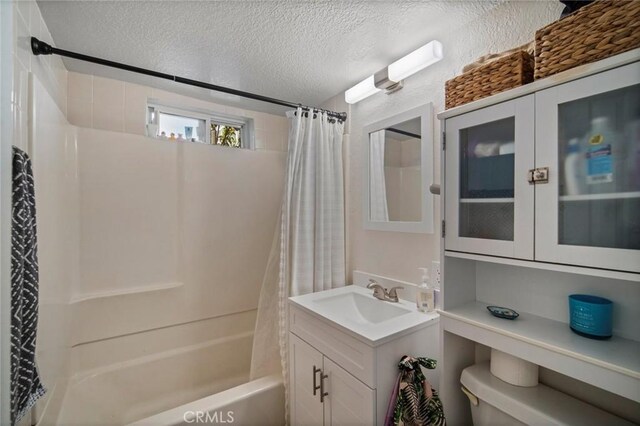 1413 Avenida De La Estrella, San Clemente, CA 92672 - full bath with shower / bathtub combination with curtain, a textured ceiling, and vanity