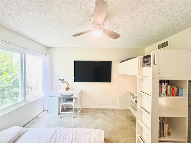 23515 Lyons Ave Unit 232, Valencia, CA 91355 - bedroom featuring multiple windows, a textured ceiling, and a ceiling fan
