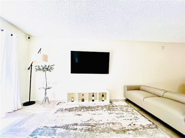 23515 Lyons Ave Unit 232, Valencia, CA 91355 - living area with a textured ceiling and baseboards