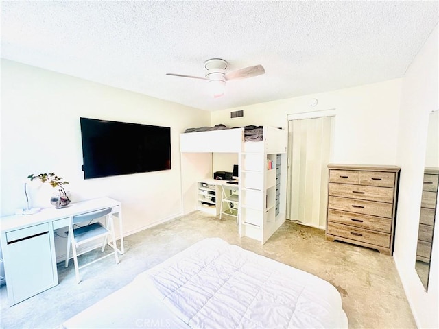 23515 Lyons Ave Unit 232, Valencia, CA 91355 - bedroom featuring an office area, a textured ceiling, and ceiling fan