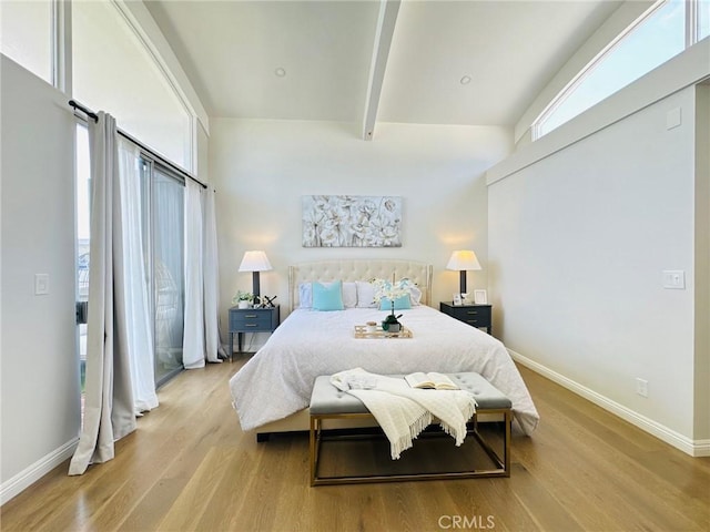 4723 La Villa Marina Unit F, Marina Del Rey, CA 90292 - bedroom with wood finished floors, multiple windows, and beam ceiling