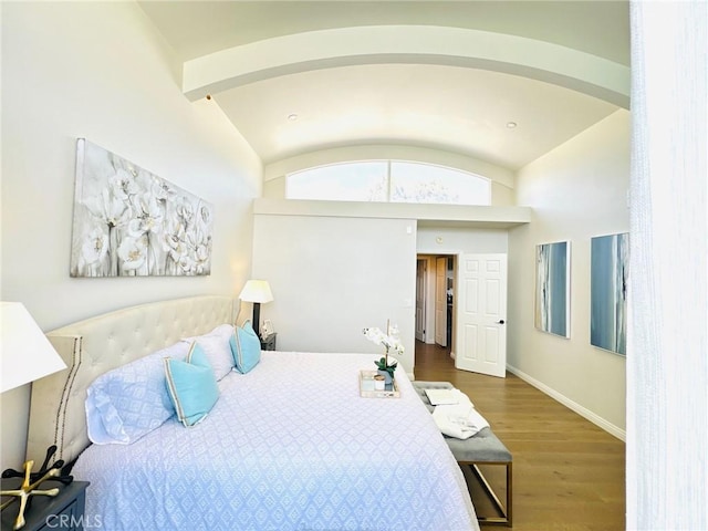 4723 La Villa Marina Unit F, Marina Del Rey, CA 90292 - bedroom with wood finished floors, vaulted ceiling, and arched walkways