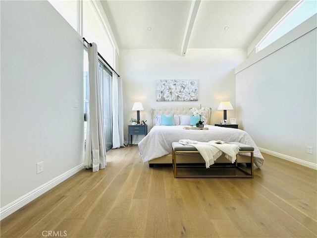 4723 La Villa Marina Unit F, Marina Del Rey, CA 90292 - bedroom with light wood-style floors and beam ceiling