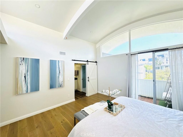 4723 La Villa Marina Unit F, Marina Del Rey, CA 90292 - bedroom featuring access to outside, wood finished floors, a barn door, beamed ceiling, and high vaulted ceiling