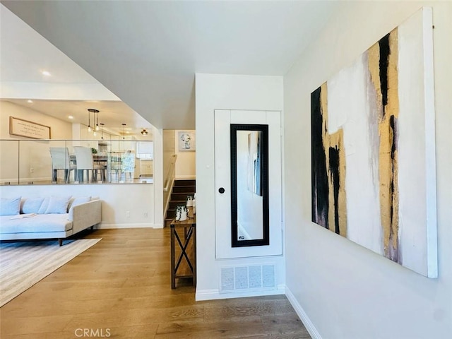 4723 La Villa Marina Unit F, Marina Del Rey, CA 90292 - corridor featuring wood finished floors, stairway, and recessed lighting
