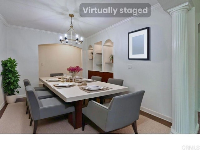 522 Garfield St, Oceanside, CA 92054 - dining area featuring ornamental molding, a chandelier, arched walkways, decorative columns, and wood finished floors