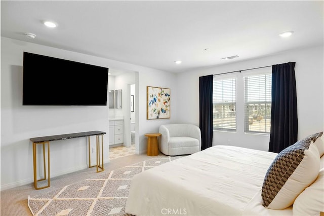 3957 E Huntington St, Ontario, CA 91761 - bedroom with light carpet, recessed lighting, and ensuite bathroom