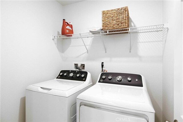 3957 E Huntington St, Ontario, CA 91761 - washroom featuring washer and dryer
