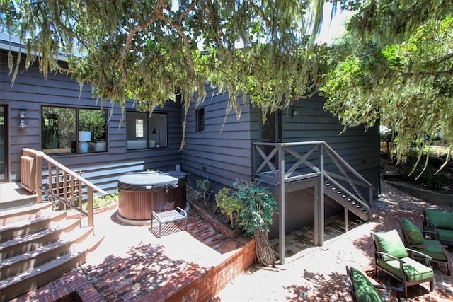 2103 Benson Ave, Cambria, CA 93428 - rear view of property featuring a hot tub and stairs