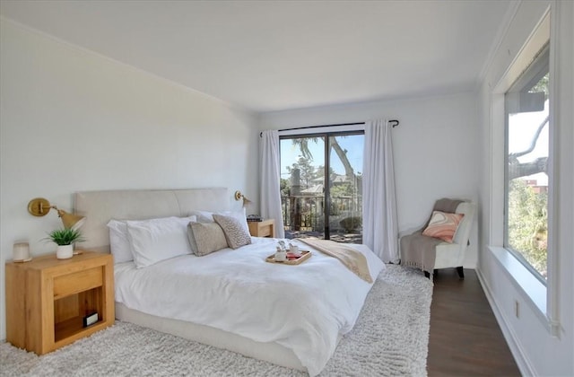 2103 Benson Ave, Cambria, CA 93428 - bedroom with ornamental molding, wood finished floors, and access to outside