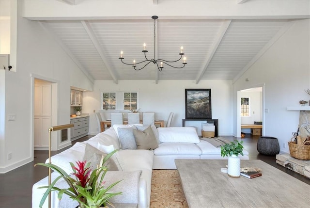 2103 Benson Ave, Cambria, CA 93428 - living room with a chandelier, high vaulted ceiling, beamed ceiling, wood finished floors, and plenty of natural light