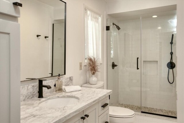 2103 Benson Ave, Cambria, CA 93428 - bathroom with vanity, a shower stall, and ornamental molding