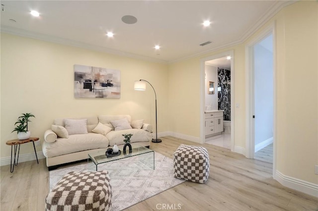 3264 E Holt Ave, West Covina, CA 91791 - living area featuring crown molding, light wood-type flooring, and recessed lighting