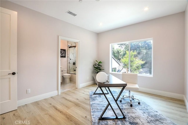 3264 E Holt Ave, West Covina, CA 91791 - home office featuring light wood-type flooring and recessed lighting