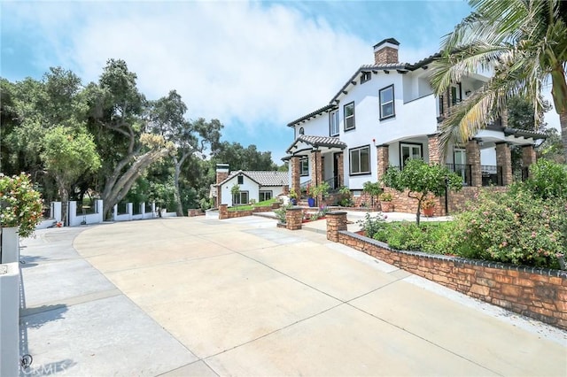 3264 E Holt Ave, West Covina, CA 91791 - view of front of property featuring a chimney and stucco siding
