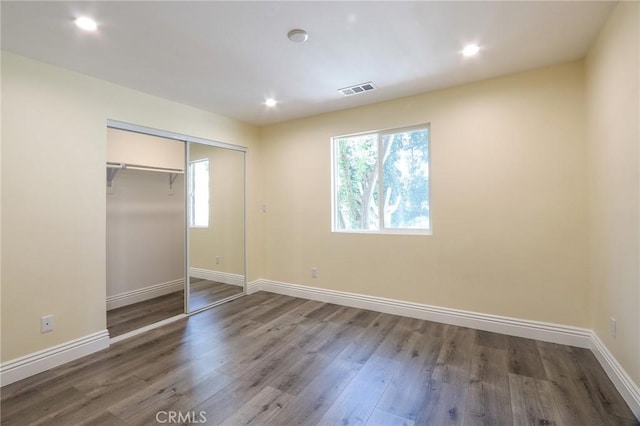 3264 E Holt Ave, West Covina, CA 91791 - unfurnished bedroom featuring wood finished floors, recessed lighting, and a closet