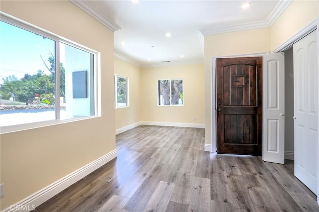 3264 E Holt Ave, West Covina, CA 91791 - foyer entrance with wood finished floors, ornamental molding, and recessed lighting