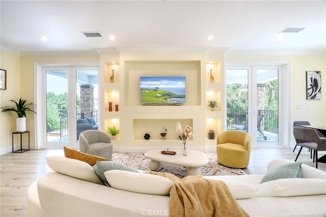 3264 E Holt Ave, West Covina, CA 91791 - living area with crown molding, healthy amount of natural light, light wood-type flooring, and built in shelves