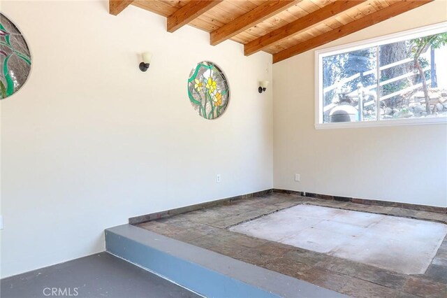 3264 E Holt Ave, West Covina, CA 91791 - spare room with a wooden ceiling with exposed beams and baseboards