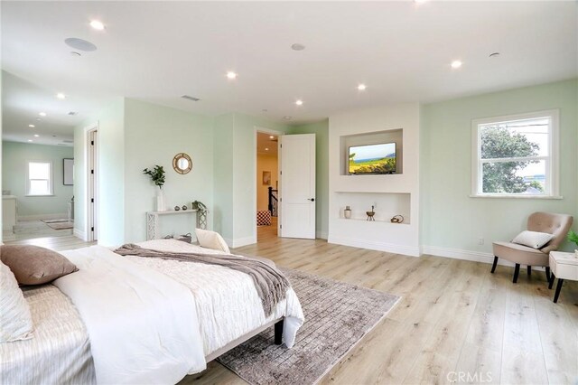 3264 E Holt Ave, West Covina, CA 91791 - bedroom featuring light wood-style flooring, recessed lighting, and ensuite bathroom