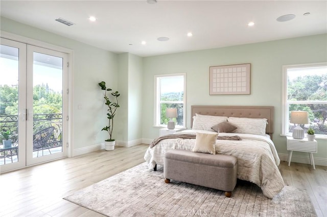 3264 E Holt Ave, West Covina, CA 91791 - bedroom with access to outside, light wood finished floors, and recessed lighting