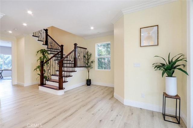 3264 E Holt Ave, West Covina, CA 91791 - entryway featuring light wood-style floors, ornamental molding, recessed lighting, and stairs