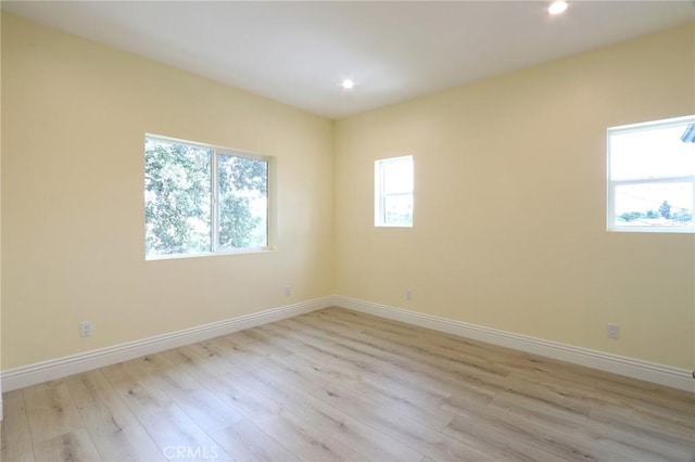 3264 E Holt Ave, West Covina, CA 91791 - unfurnished room with light wood-style flooring and recessed lighting