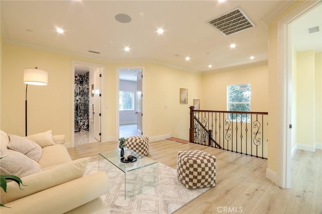 3264 E Holt Ave, West Covina, CA 91791 - living area with wood finished floors, plenty of natural light, recessed lighting, and crown molding