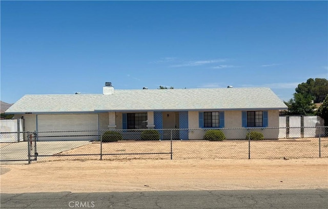 12821 Algonquin Rd, Apple Valley, CA 92308 - single story home featuring a garage, concrete driveway, stucco siding, and a chimney