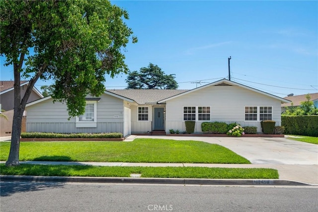 2458 W Marian Ave, Anaheim, CA 92804 - single story home featuring a front yard and concrete driveway