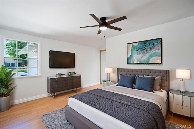 2458 W Marian Ave, Anaheim, CA 92804 - bedroom with wood finished floors, ceiling fan, and vaulted ceiling