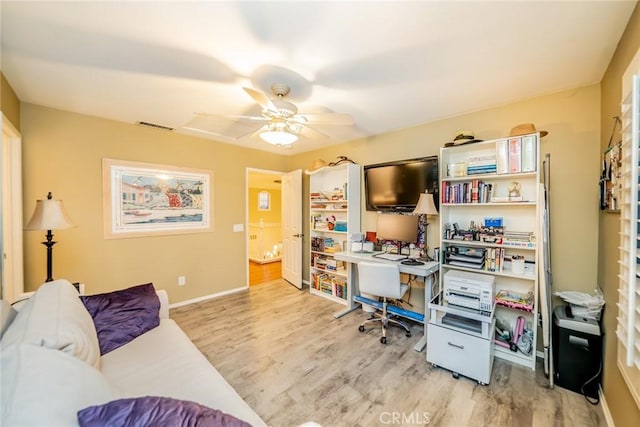 3141 Brunstane Cir, Corona, CA 92882 - home office with wood finished floors and a ceiling fan