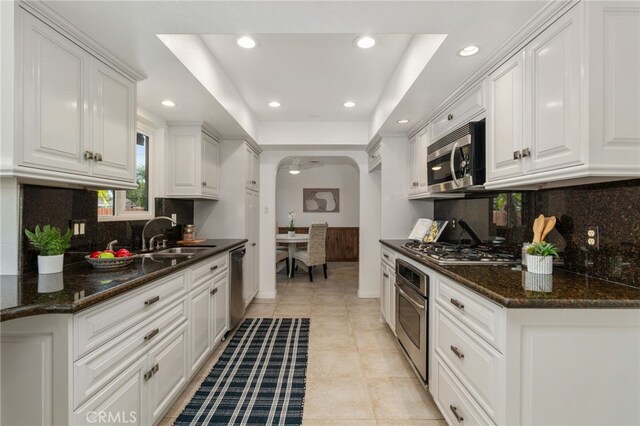 2041 Caballeros Rd, Norco, CA 92860 - kitchen with stainless steel appliances, white cabinets, recessed lighting, and backsplash