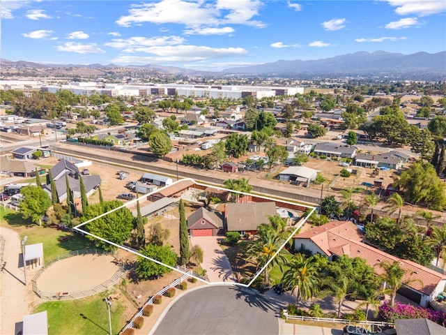 2041 Caballeros Rd, Norco, CA 92860 - aerial perspective of suburban area featuring a mountain backdrop and property parcel outlined