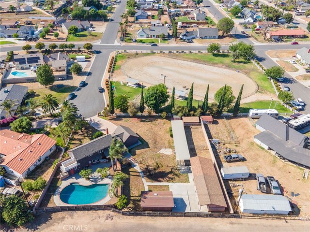 2041 Caballeros Rd, Norco, CA 92860 - aerial overview of property's location featuring a pool and nearby suburban area