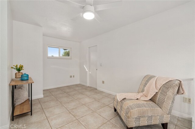 2041 Caballeros Rd, Norco, CA 92860 - sitting room with light tile patterned flooring and ceiling fan