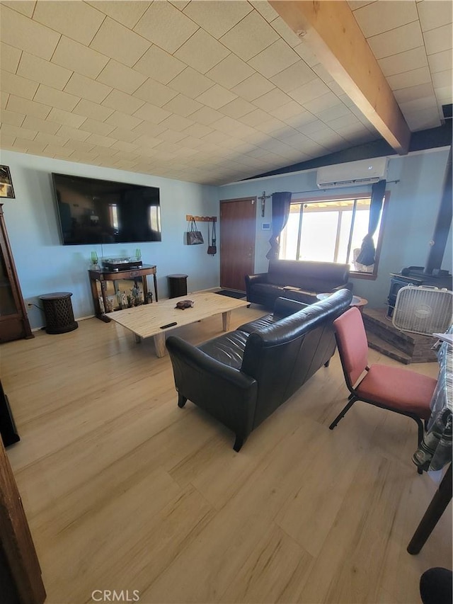 5566 Oleta Rd, Landers, CA 92285 - living room featuring a wall unit AC and wood finished floors