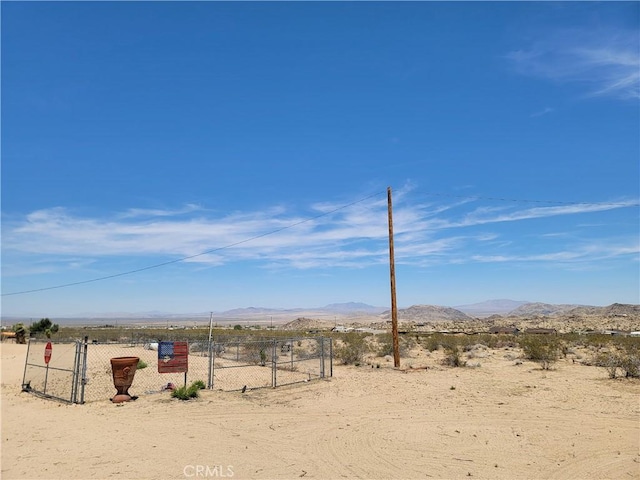 5566 Oleta Rd, Landers, CA 92285 - view of mountain backdrop with a desert landscape and rural landscape