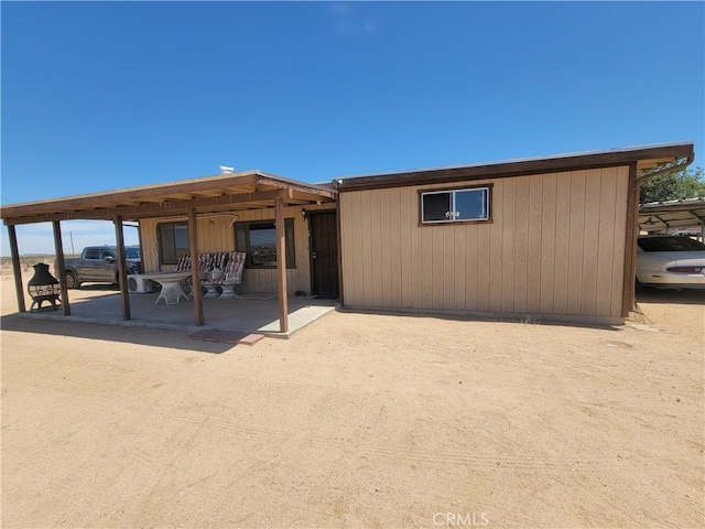 5566 Oleta Rd, Landers, CA 92285 - rear view of house featuring a patio area
