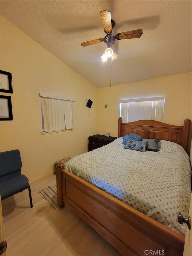 5566 Oleta Rd, Landers, CA 92285 - bedroom with lofted ceiling, light wood-type flooring, and ceiling fan