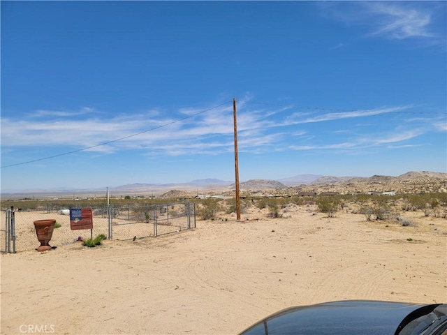 5566 Oleta Rd, Landers, CA 92285 - view of mountain backdrop with a desert landscape