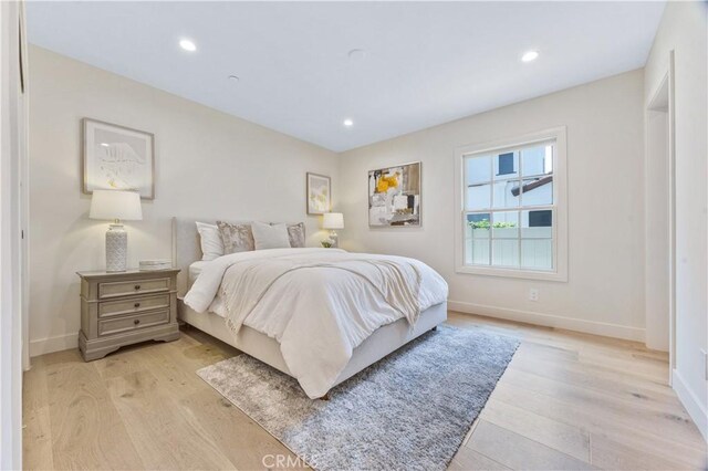 1620 Rubio Dr, San Marino, CA 91108 - bedroom with light wood-style flooring and recessed lighting
