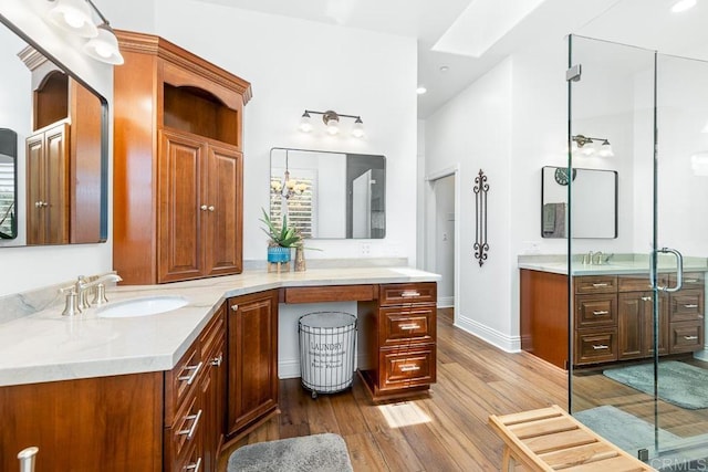 10166 Rancho Roble Rd, Escondido, CA 92026 - full bath with wood finished floors, vanity, a stall shower, and recessed lighting