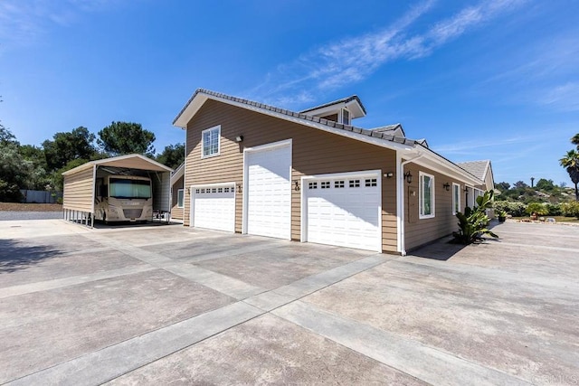 10166 Rancho Roble Rd, Escondido, CA 92026 - view of side of property with concrete driveway