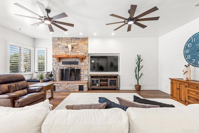 10166 Rancho Roble Rd, Escondido, CA 92026 - living room featuring a ceiling fan, wood finished floors, recessed lighting, and a stone fireplace