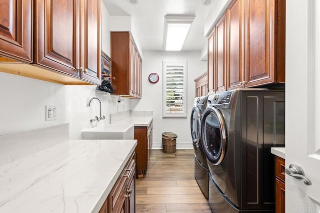 10166 Rancho Roble Rd, Escondido, CA 92026 - washroom with washing machine and clothes dryer, cabinet space, and dark wood-style floors