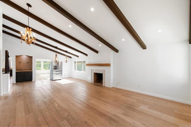 13837 Tam O Shanter Ct, Poway, CA 92064 - unfurnished living room with a chandelier, a fireplace, light wood-type flooring, and recessed lighting