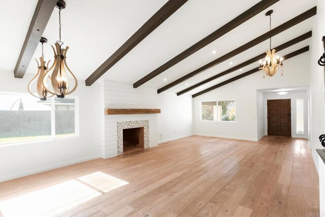13837 Tam O Shanter Ct, Poway, CA 92064 - unfurnished living room featuring a chandelier, light wood finished floors, a large fireplace, and recessed lighting