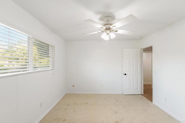 13837 Tam O Shanter Ct, Poway, CA 92064 - spare room with light colored carpet and a ceiling fan